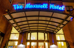 Exterior of hotel front entrance at night