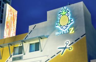 Exterior detailed view of hotel facade and sign